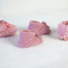 Mademoiselle Rose Une paire de chausson en laine naissance et une paire de chausson 3/6 mois en rose tendre layette.